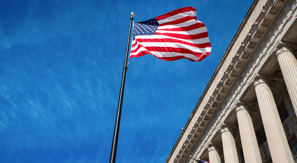 American flag in front of government agency