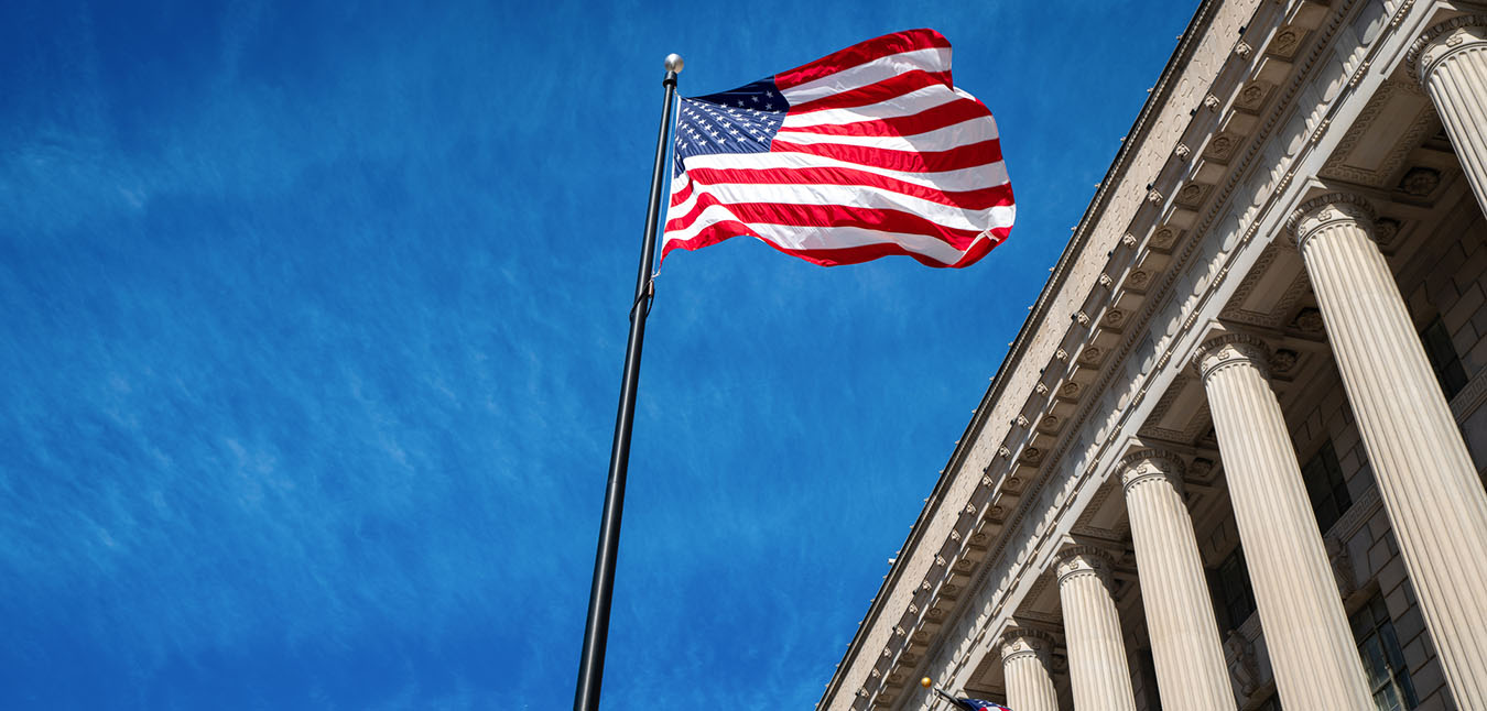 American flag in front of government agency