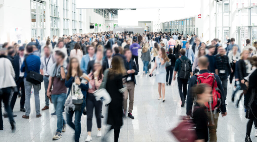 Business people at a busy industry conference