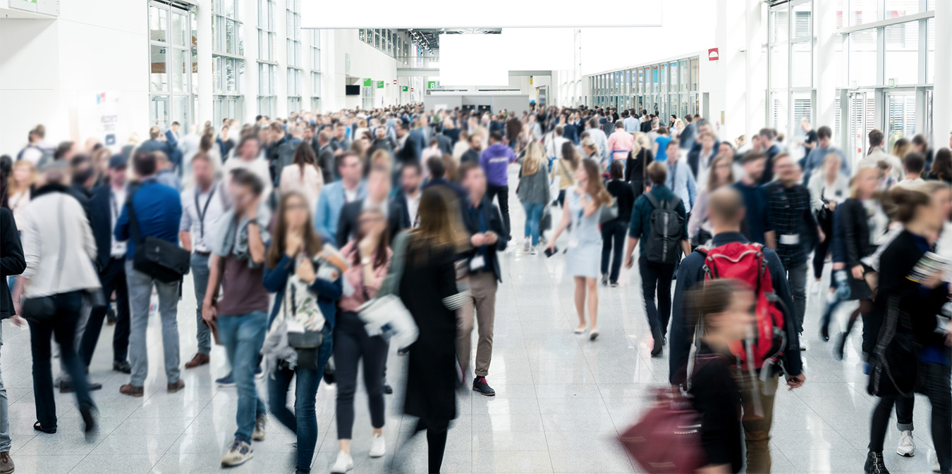 Business people at a busy industry conference