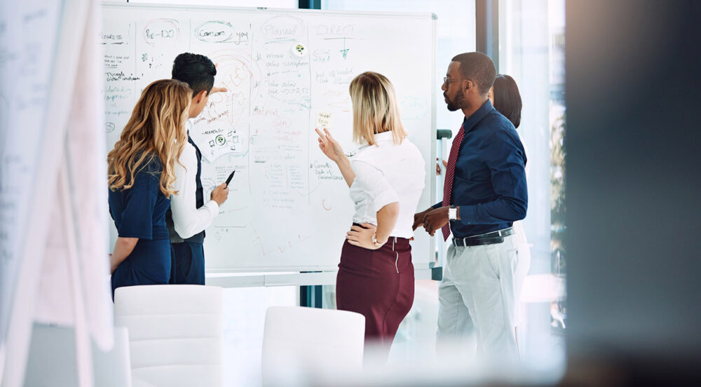 Trade association professionals working on their communications strategy