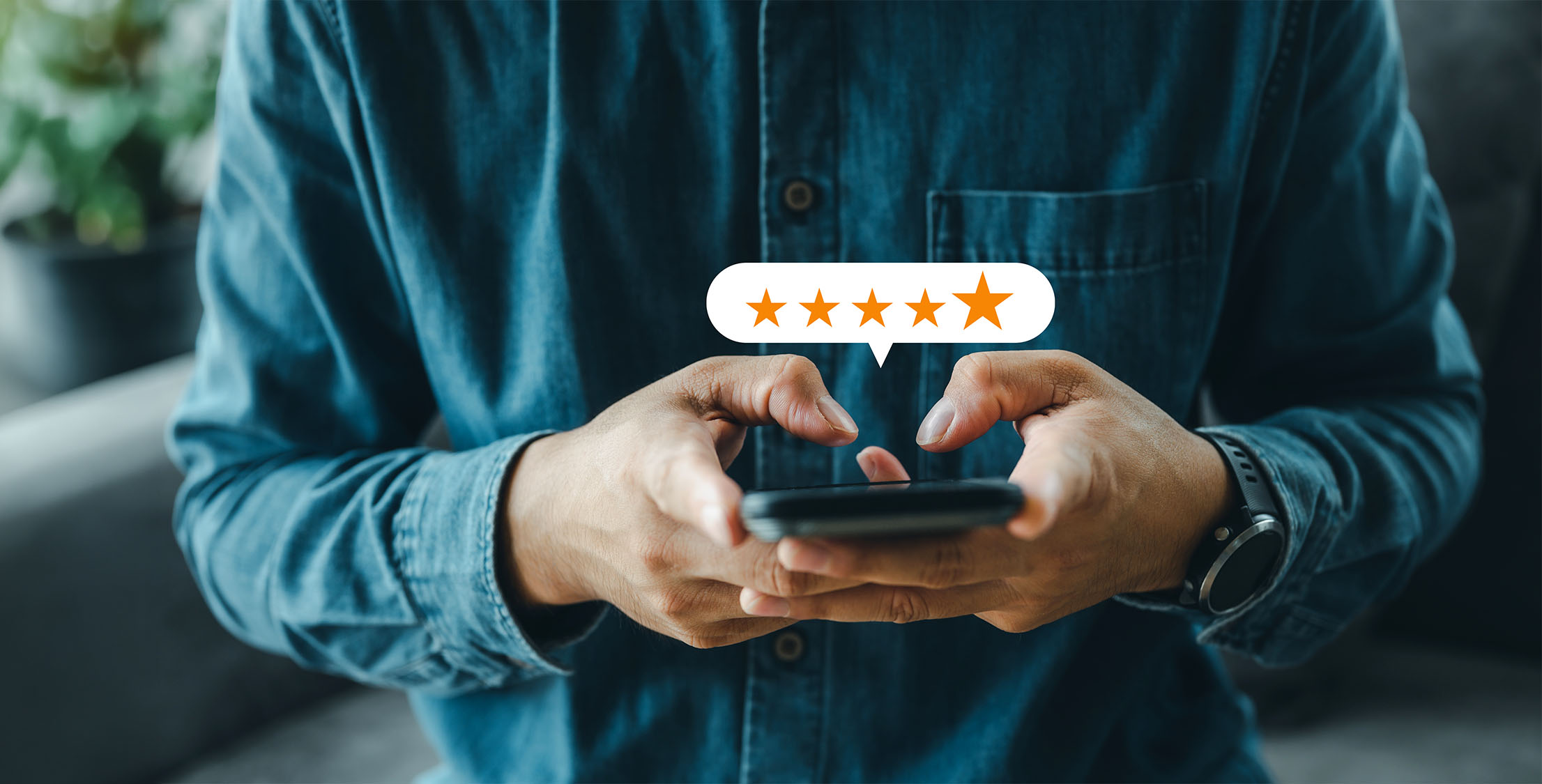 Man using smartphone for customer satisfaction survey